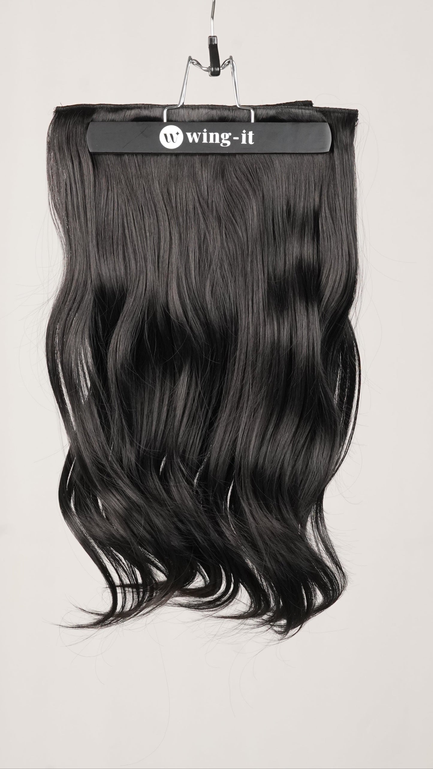 Blow Dry Wavy Total Volume clip-in extensions in black, five-piece