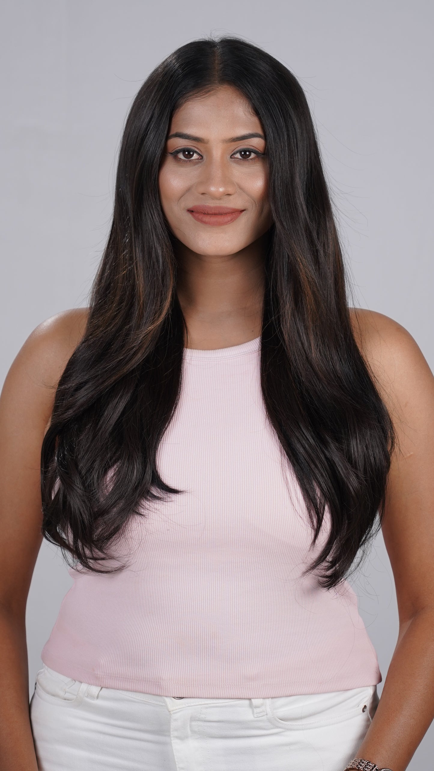 Model showing Blow Dry Wavy Total Volume salon-style extensions