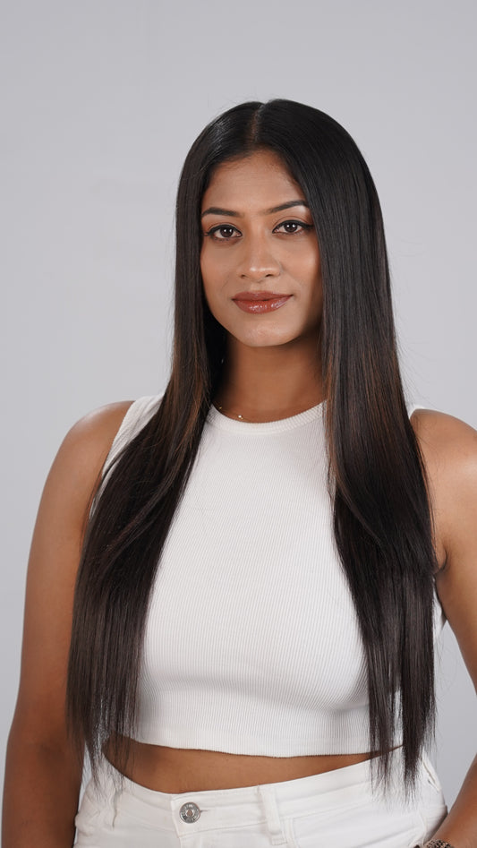 Model with sleek look using Straight Quick Volume clip-in extension