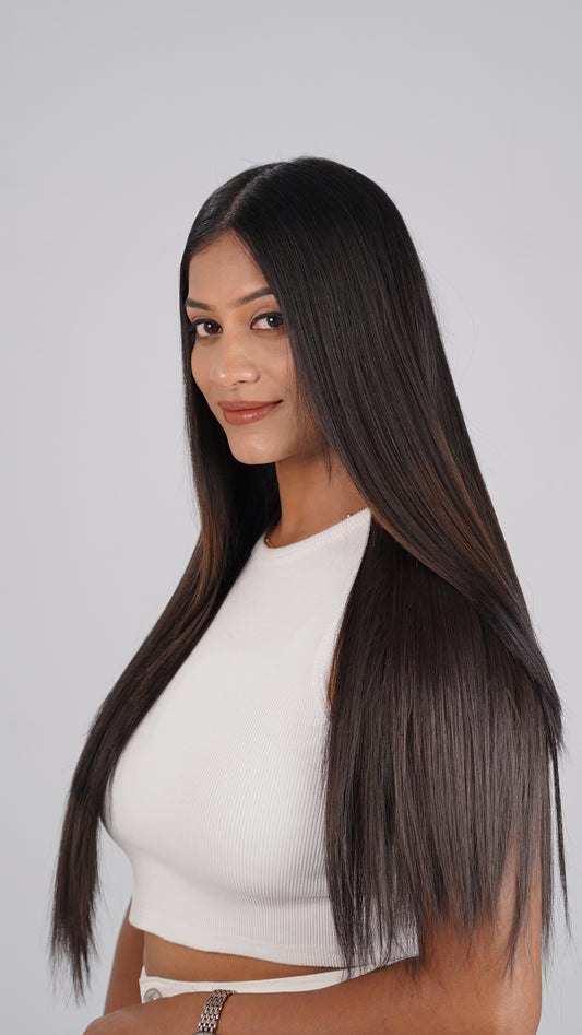 Model with sleek look using Straight Quick Volume clip-in extension