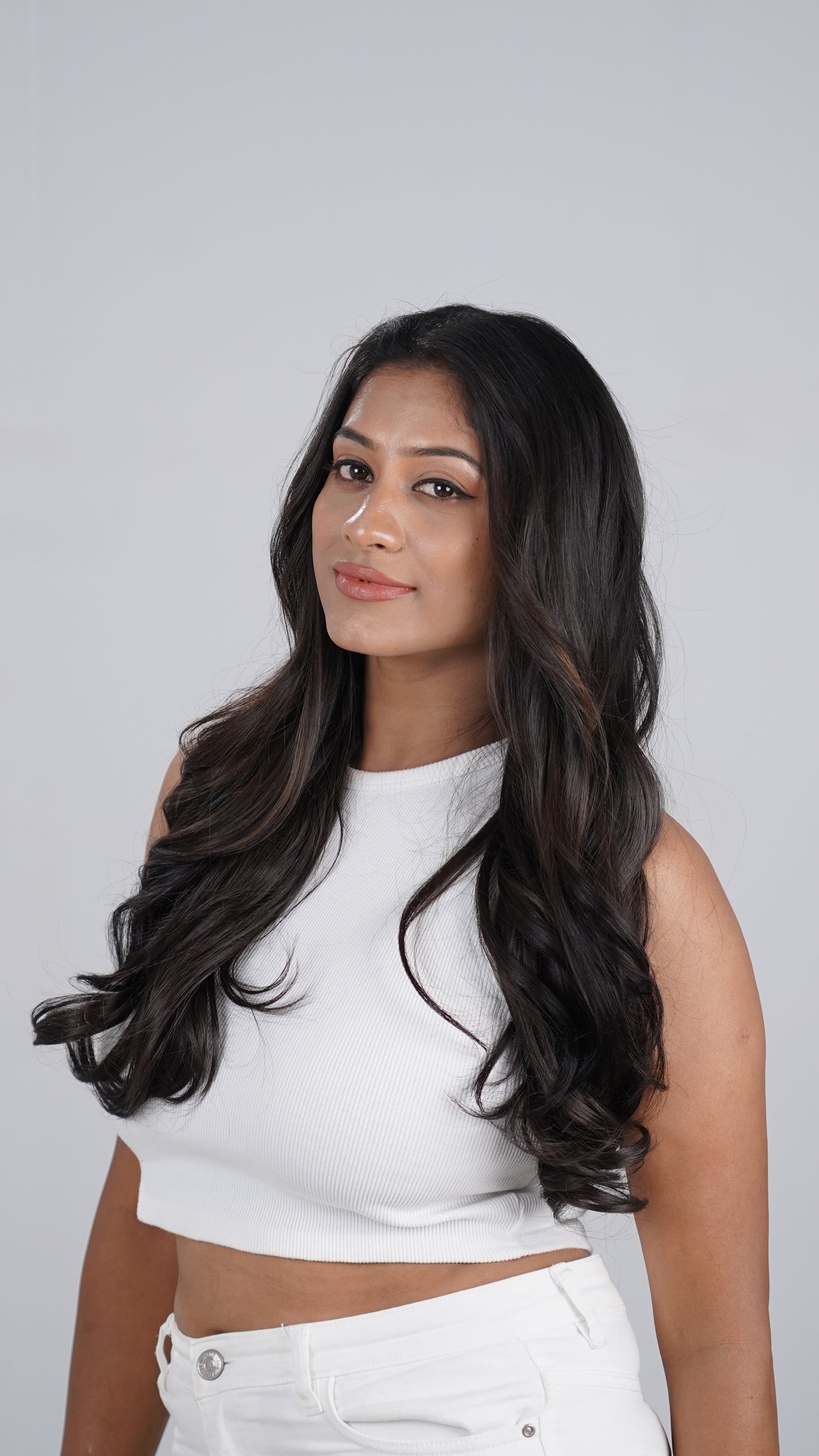 Model wearing Curly Quick Volume clip-in hair extension, one-piece