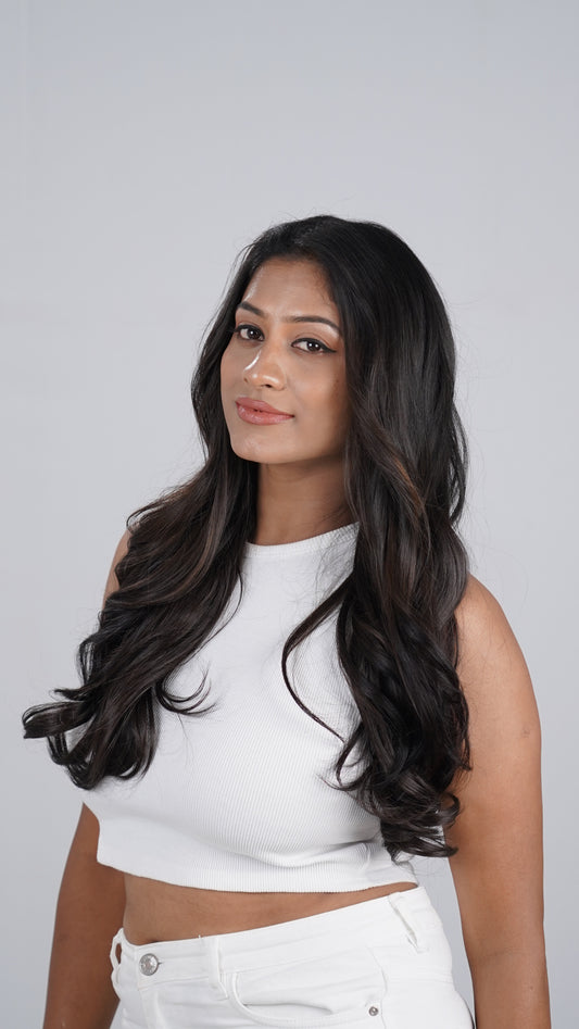 Model wearing Curly Quick Volume clip-in hair extension, one-piece