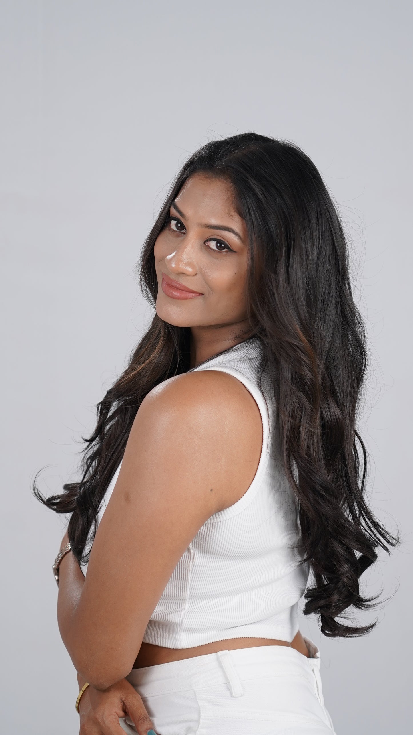 Model wearing Curly Quick Volume clip-in hair extension, one-piece